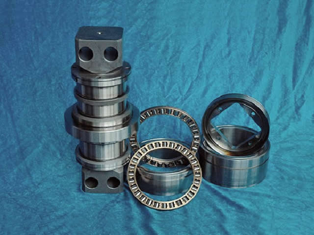 Mine hob core-wrapped bearings